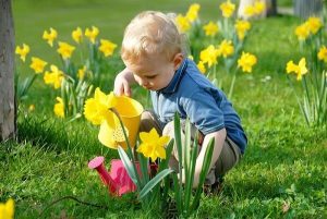 child wiht autism spectrum disorder in garden