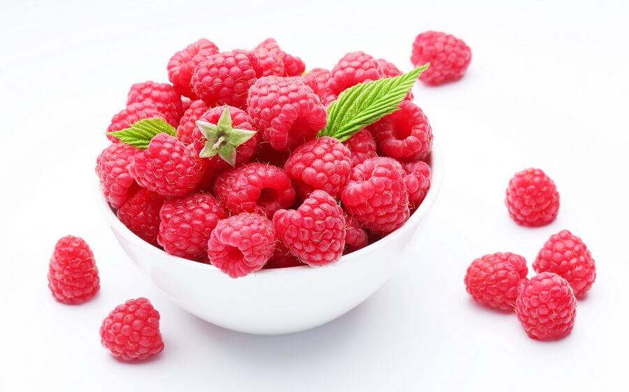 1 raspberries in a white bowl
