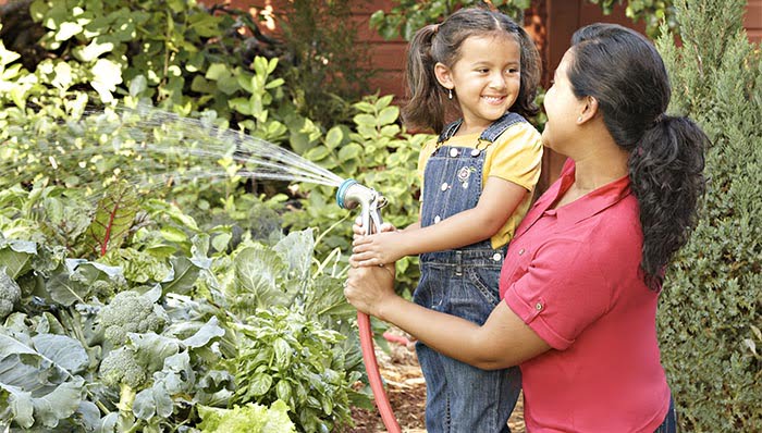 1 mom gardening with daughter