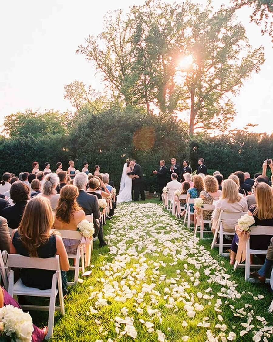 aisle covered in white petals, spring wedding ideas