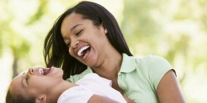 1 mom and child laughing