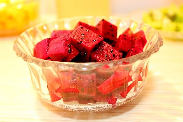 Red dragon fruit diced in a bowl