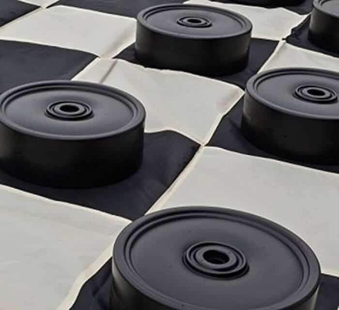Giant checkers set in black and white