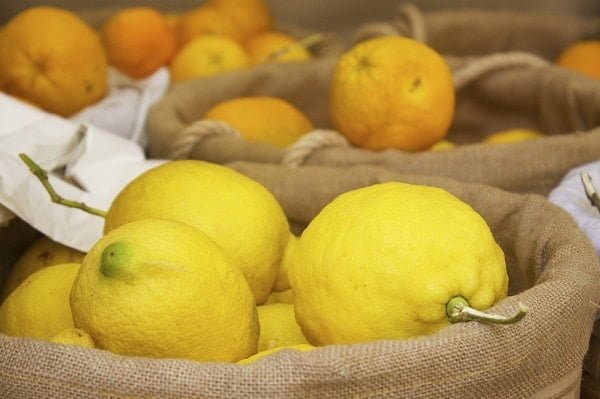 ripe lemons in baskets 