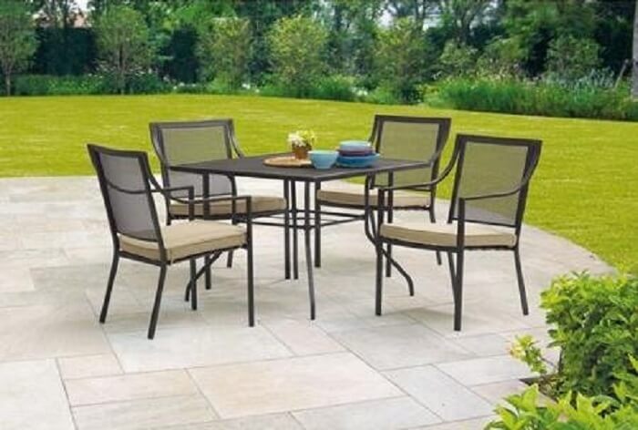 Mainstays Bellingham outdoor dining set placed on pavement