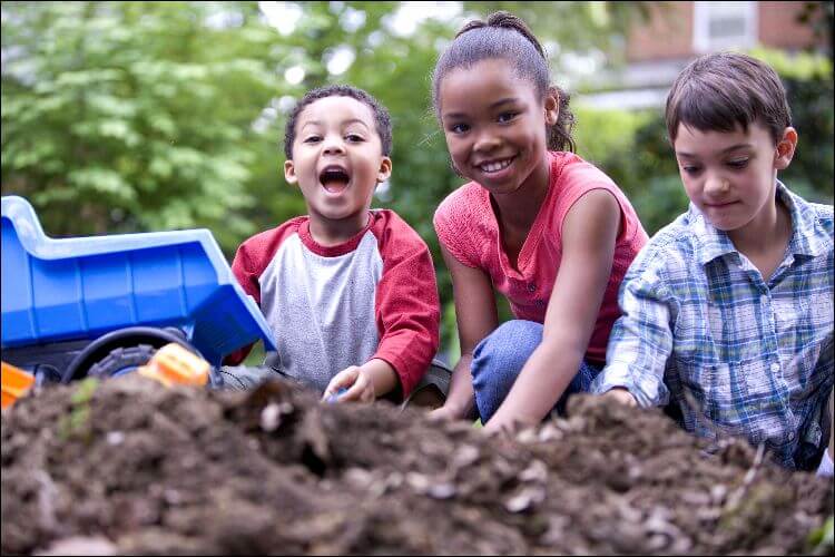 children playing in dirt
