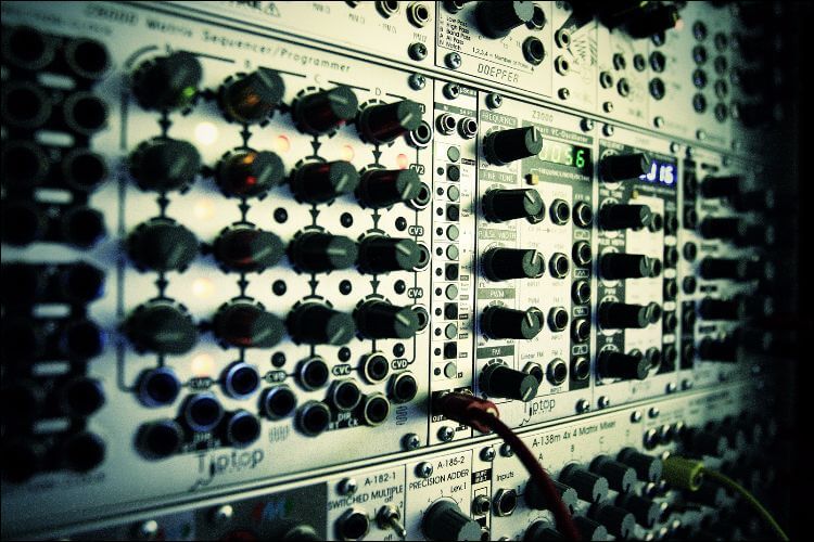 Close up of a modular synthesizer useful for a studio shed