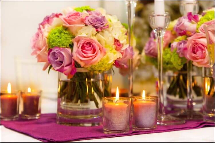 winter wonderland wedding centerpieces made with roses and candles