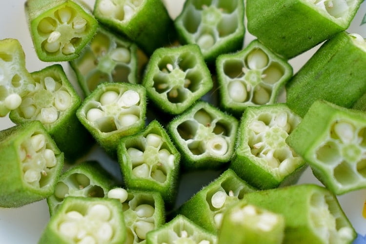Sliced okra pods with tiny seeds inside