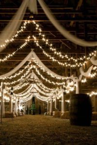 lights and draped fabric wedding reception lighting ideas